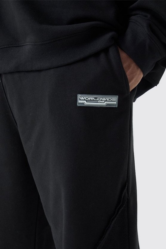 Plus lockere Jogginghose mit rohem Saum