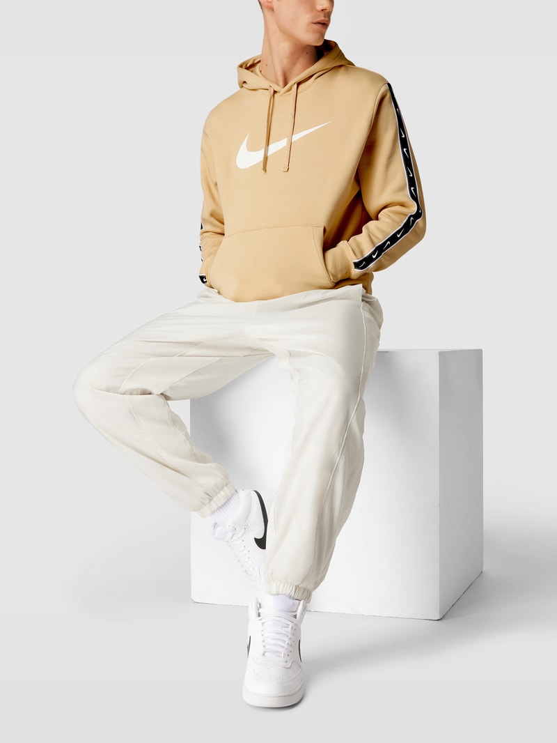 Hoodie mit Känguru-Tasche Modell 'Repeat' in beige