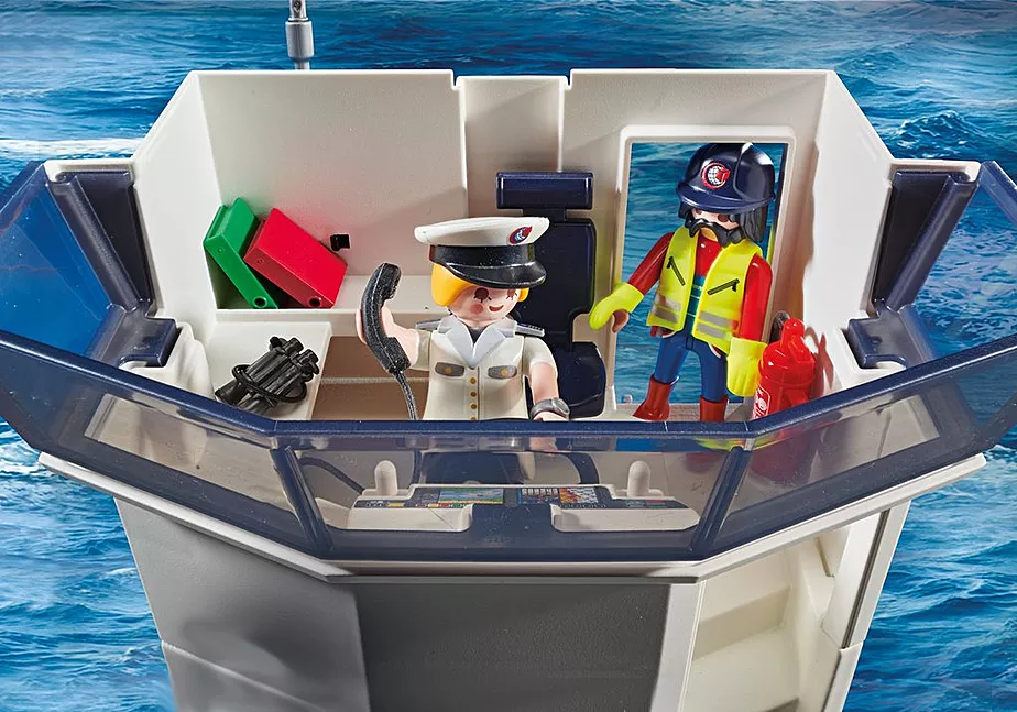 Gro&szlig;es Containerschiff mit Zollboot