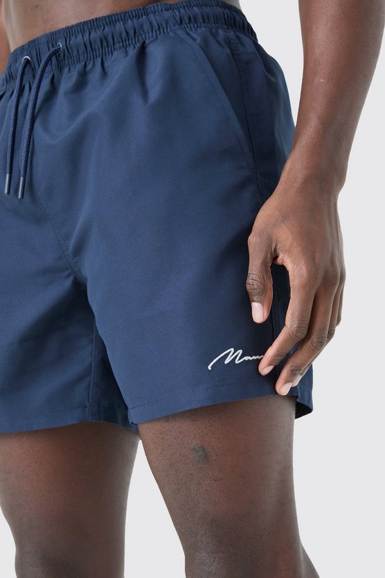 Man Signature mittellange Badehose