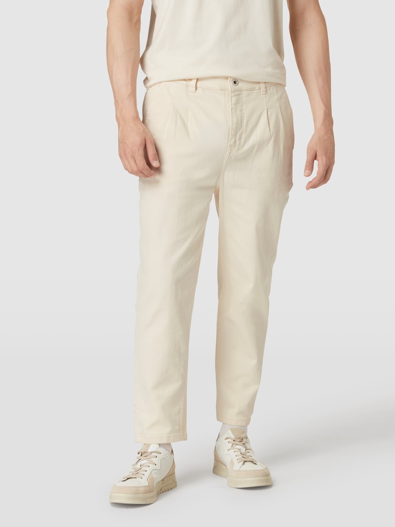 Tapered Fit Jeans mit Label-Patch in offwhite