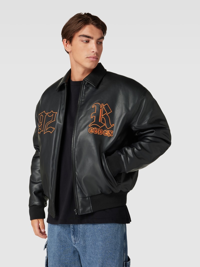 Jacke in Leder-Optik in schwarz