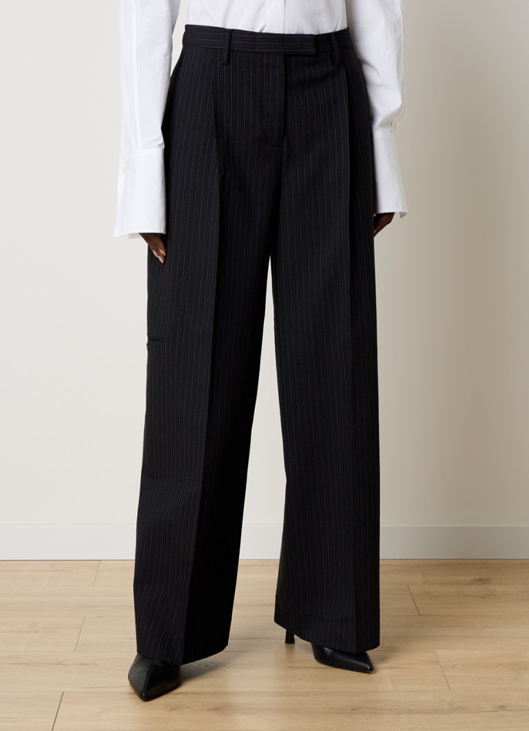 Pantaloni a vita alta e gamba larga di Acne Studios in misto lana a righe sottili.