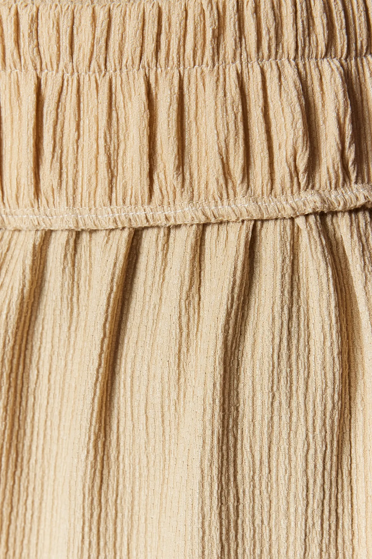 Trendyol Collection  Beiger Rock mit Rüschen und normaler Taille, Wickel-Mini-Strickrock TWOSS21ET0056
