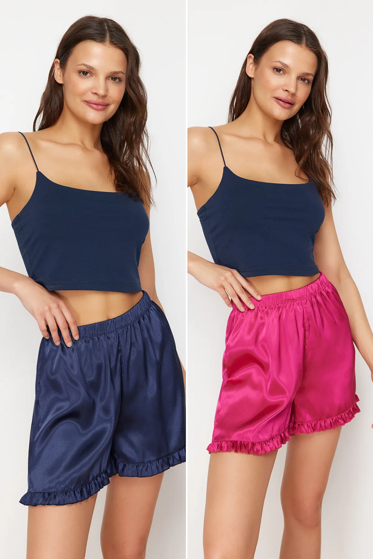 Trendyol Collection  2er-Pack Pyjamahosen aus Satin mit Rüschendetail in Marineblau und Rosa - THMSS24PJ00029