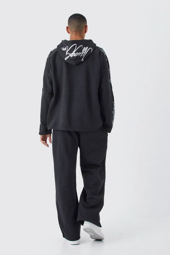 Oversize Trainingsanzug mit rohem Saum und Stickerei
