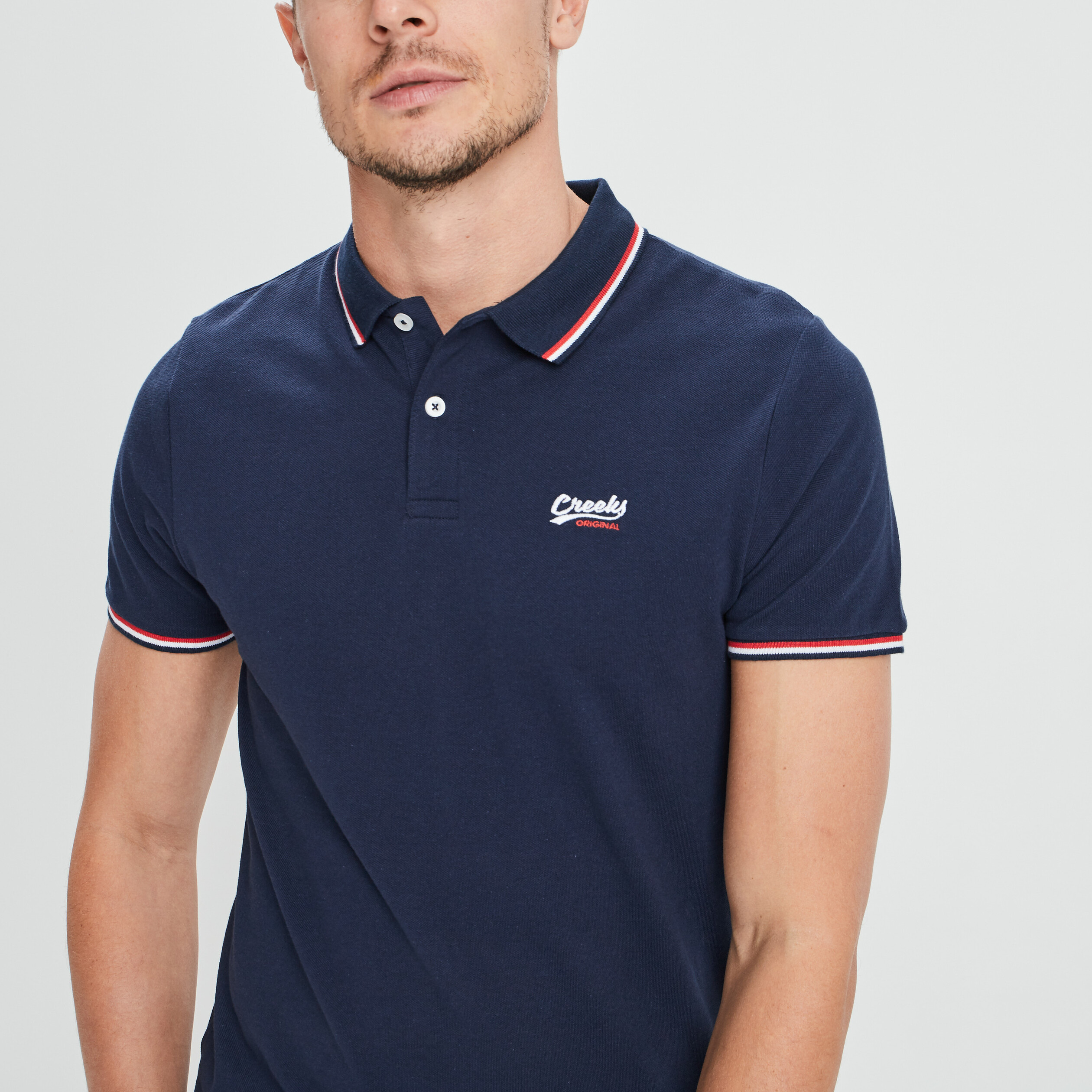 Polo avec broderie poitrine Creeks bleu marine homme | La Halle