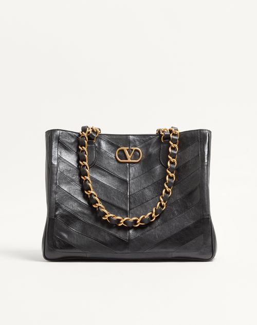 Valentino Garavani Laseine boodschappentas van nappaleer met chevronmotief.