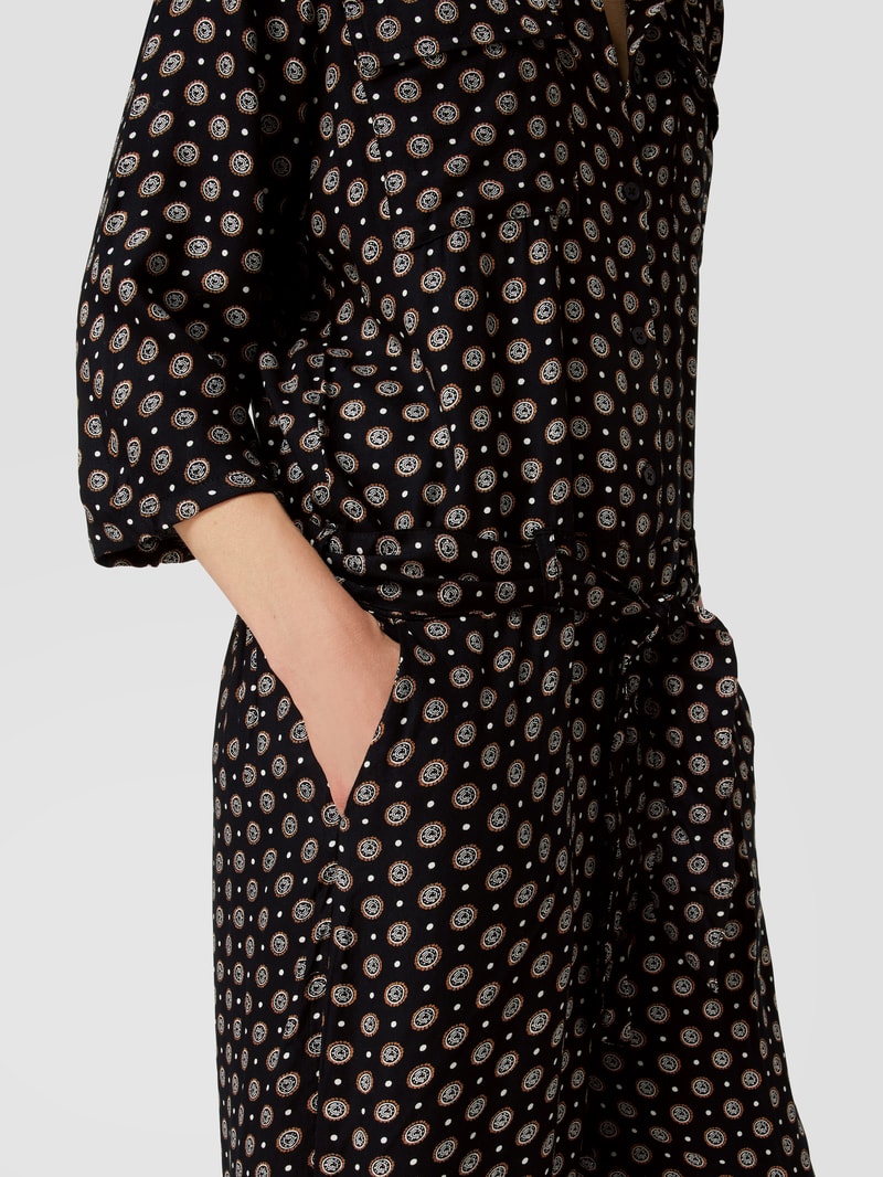 PLUS SIZE Jumpsuit mit Allover-Muster Modell 'Karutie' in schwarz