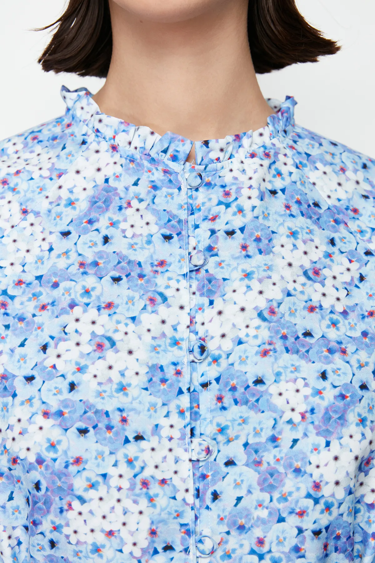 Trendyol Modest  Hellblaue gewebte Tunika mit Blumenmuster TCTSS24UK00025