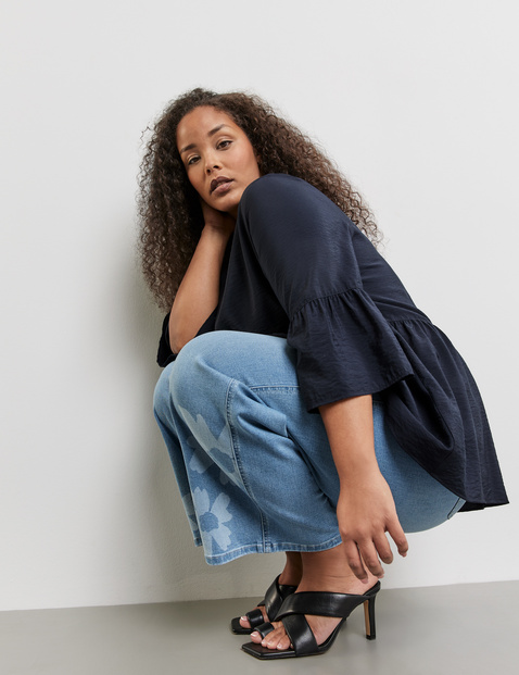 Ausgestellte Bluse mit Volants