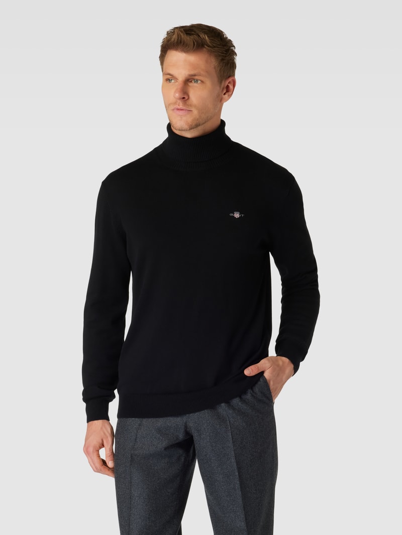 Rollkragenpullover mit Label-Stitching aus Baumwoll-Woll-Mix in schwarz