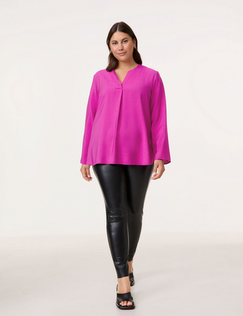 Fein schimmernde Bluse