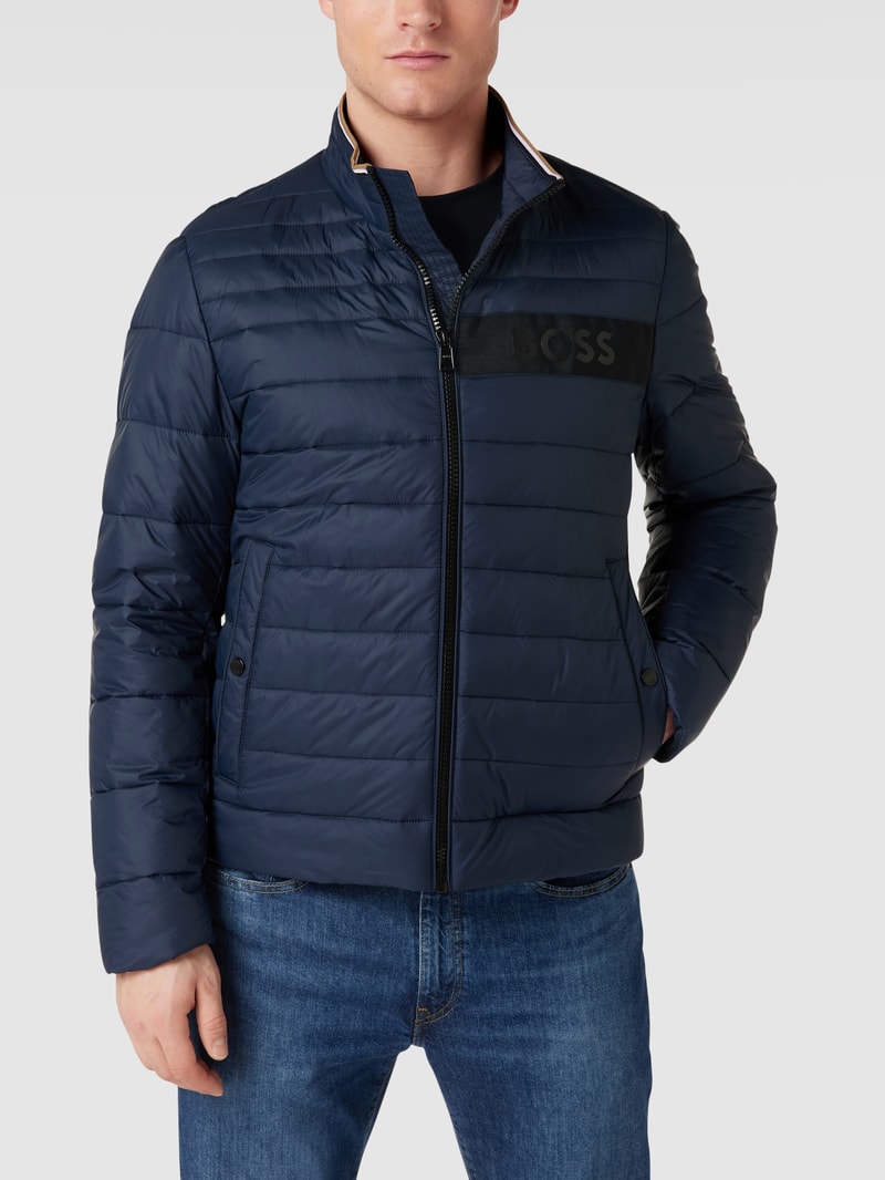 Steppjacke mit Label-Patch Modell 'Darolus' in dunkelblau