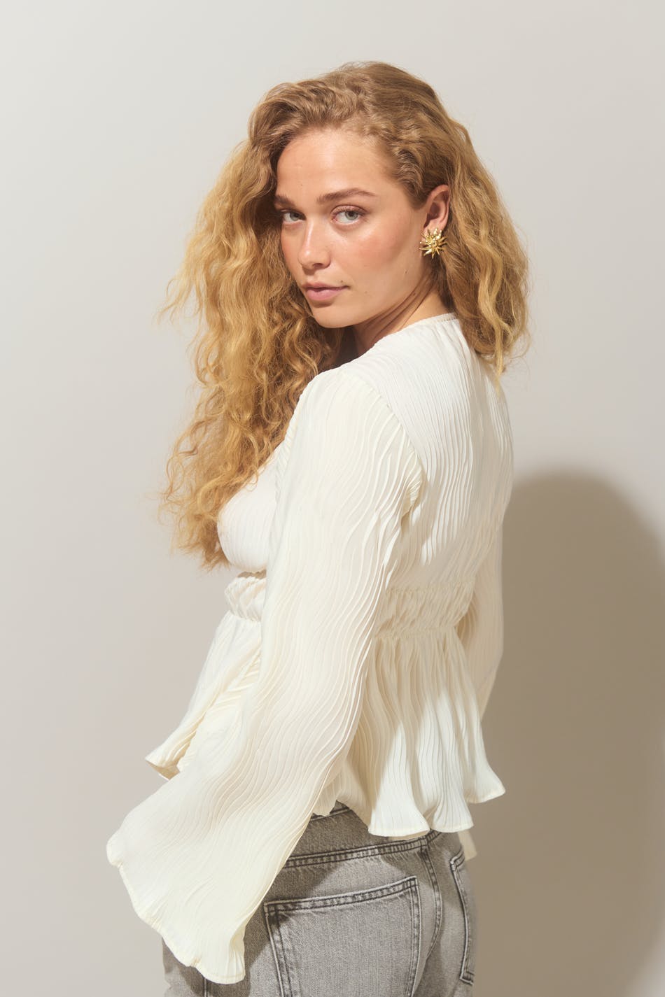 Pleated peplum top