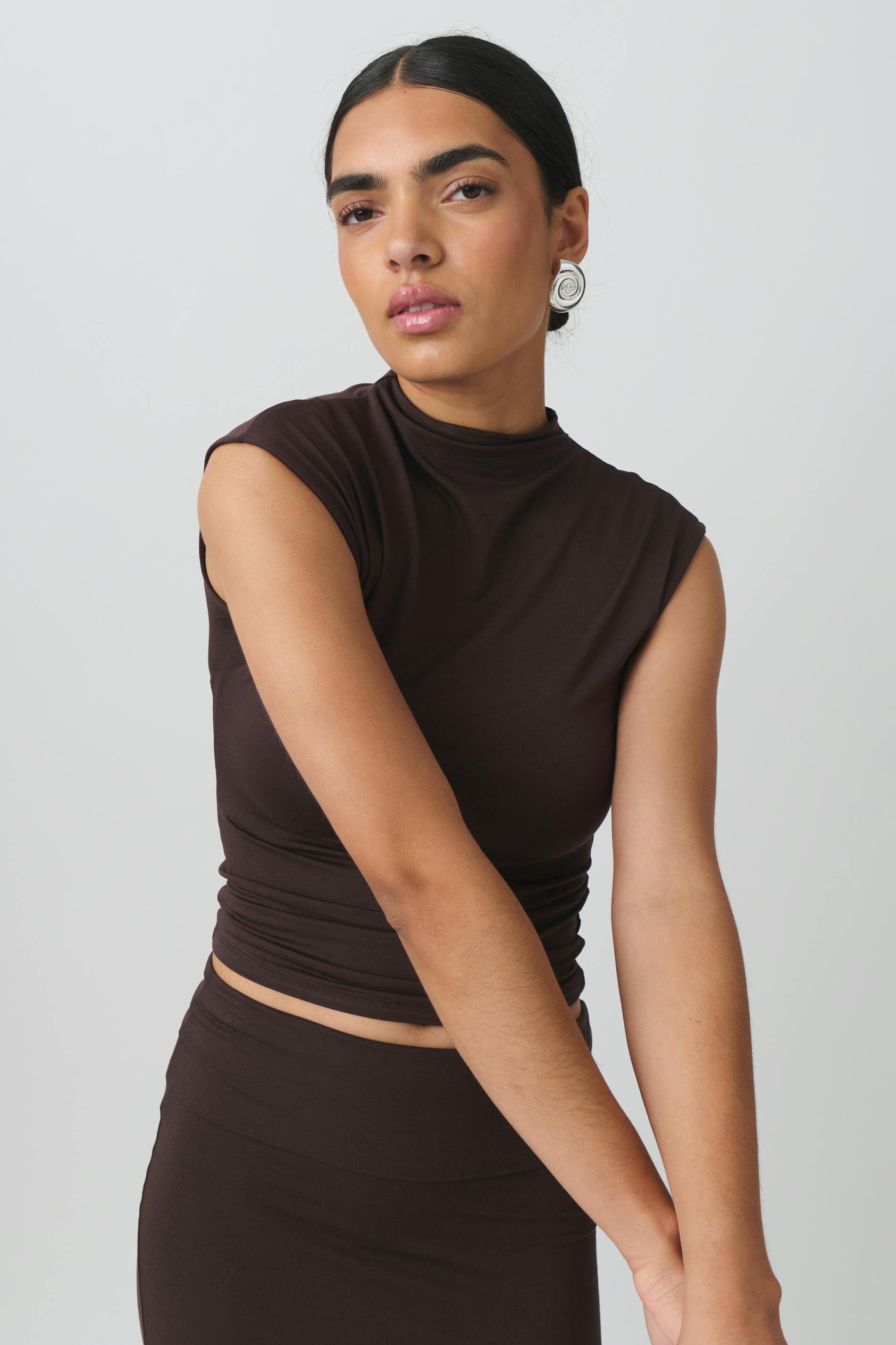 Soft touch funnel neck top