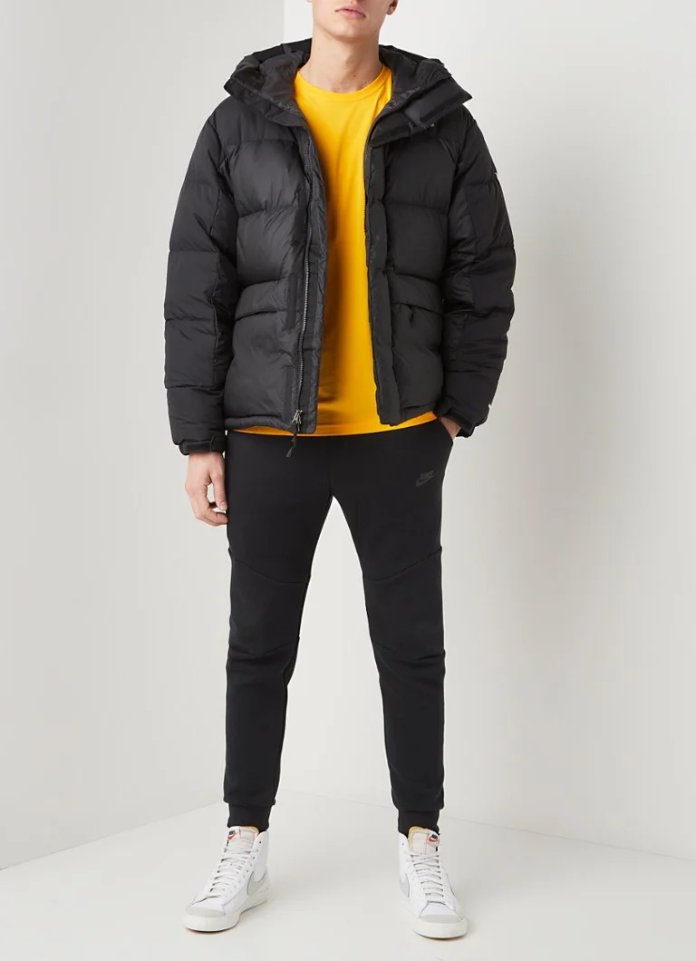 Jaqueta puffer The North Face Himalayan com enchimento de plumas e capuz.