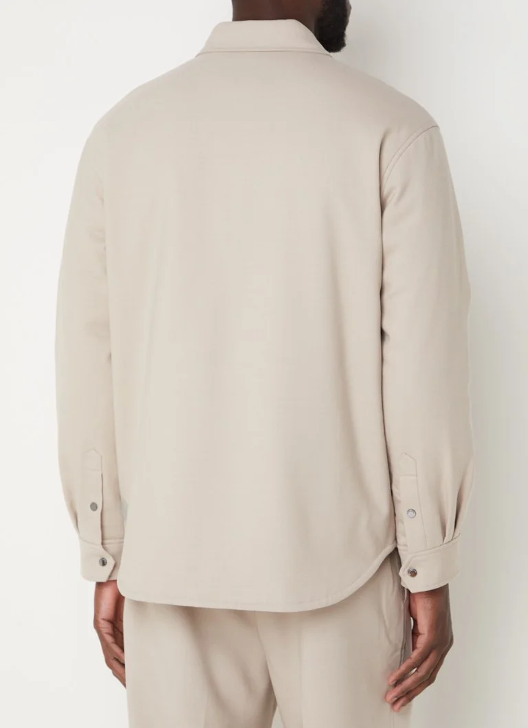 Jachetă clasică Emporio Armani, confecționată din amestec de lână, cu buzunare laterale.