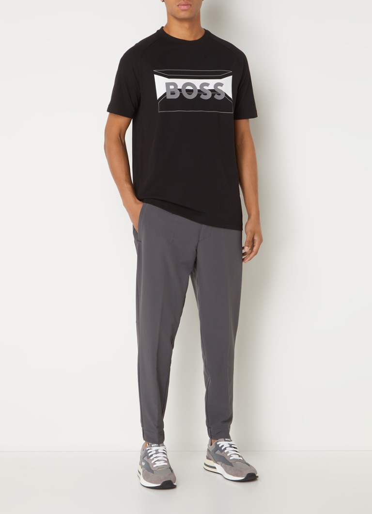 Pantaloni de trening HUGO BOSS T_Flex cu croială slim și buzunare laterale.