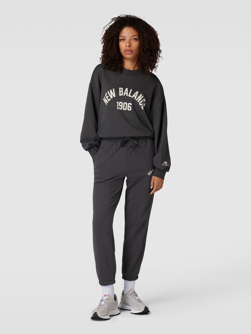 Sweatpants mit Logo-Print Modell 'Essentials Varsity' in schwarz