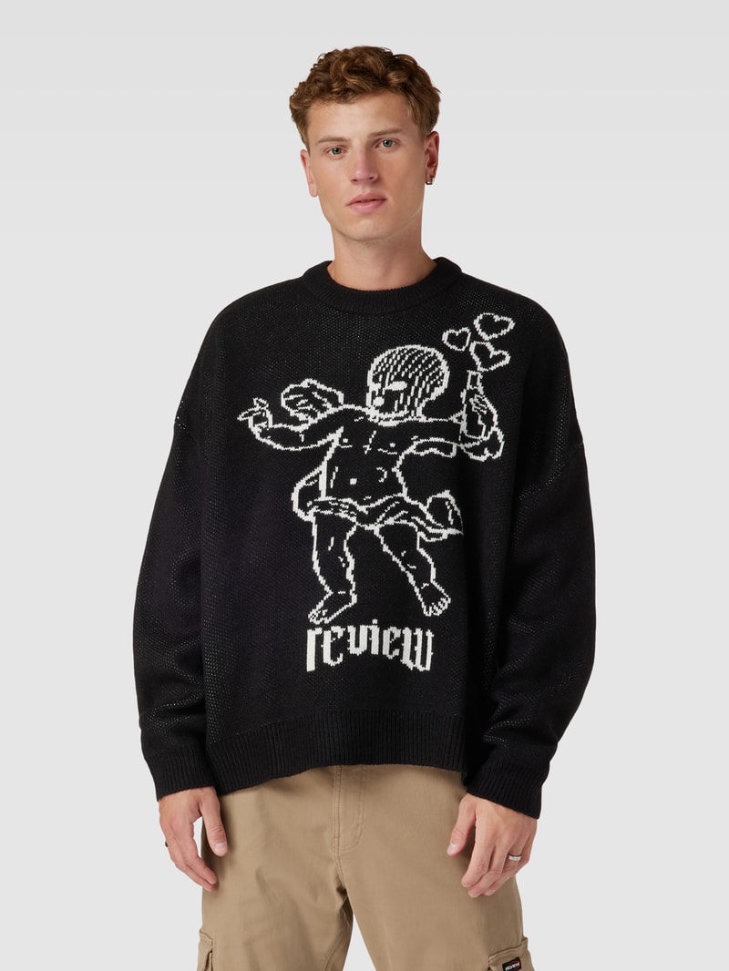 Strickpullover mit überschnittenen Schultern in schwarz