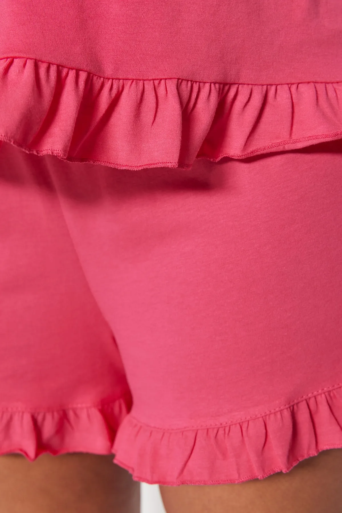 Trendyol Curve  Fuchsiafarbenes Pyjama-Set mit Strick- und Schnürdetails TBBSS22PT0564
