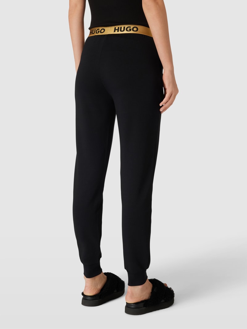 Stoffhose mit elastischem Logo-Bund in gold