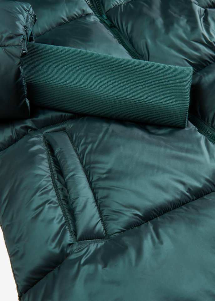 Steppjacke mit Strickärmeln