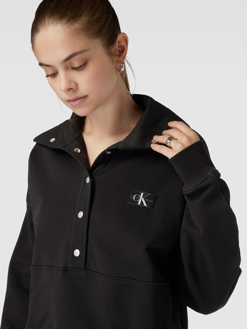 Sweatshirt mit Druckknopfleiste in black