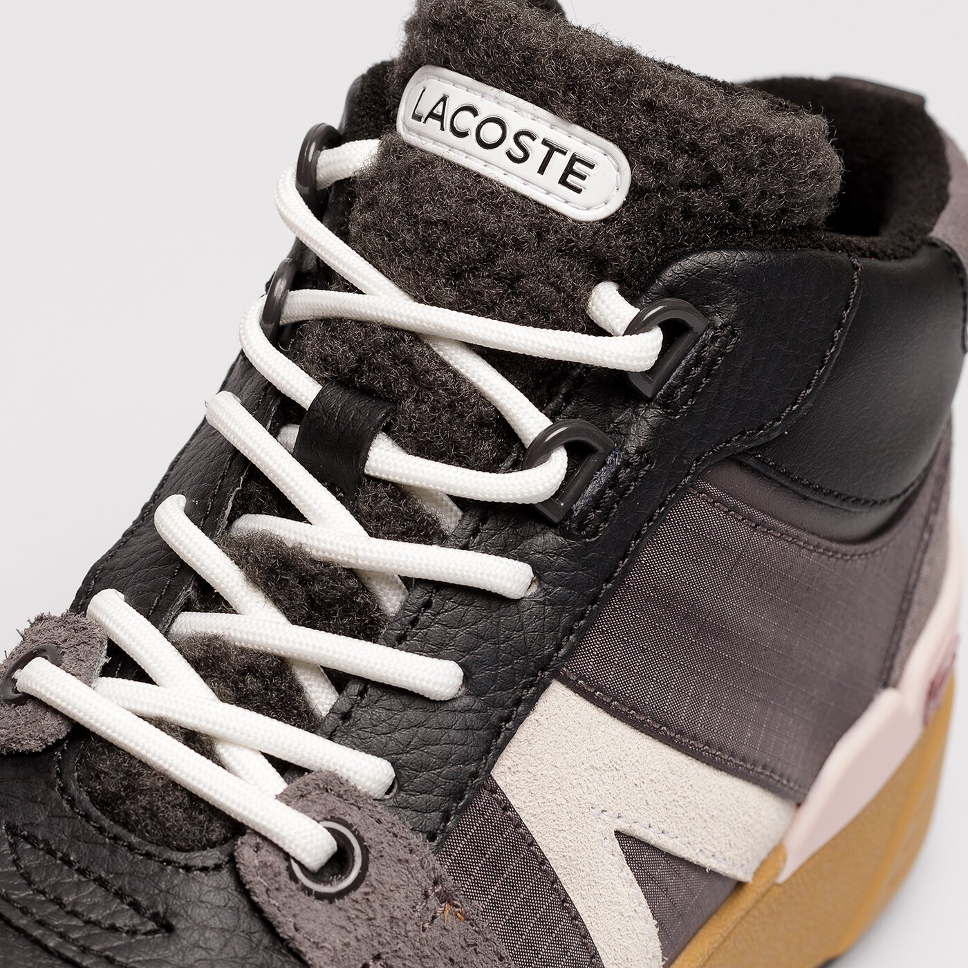 LACOSTE L002 WNTR MID 2221 SFA Schwarz