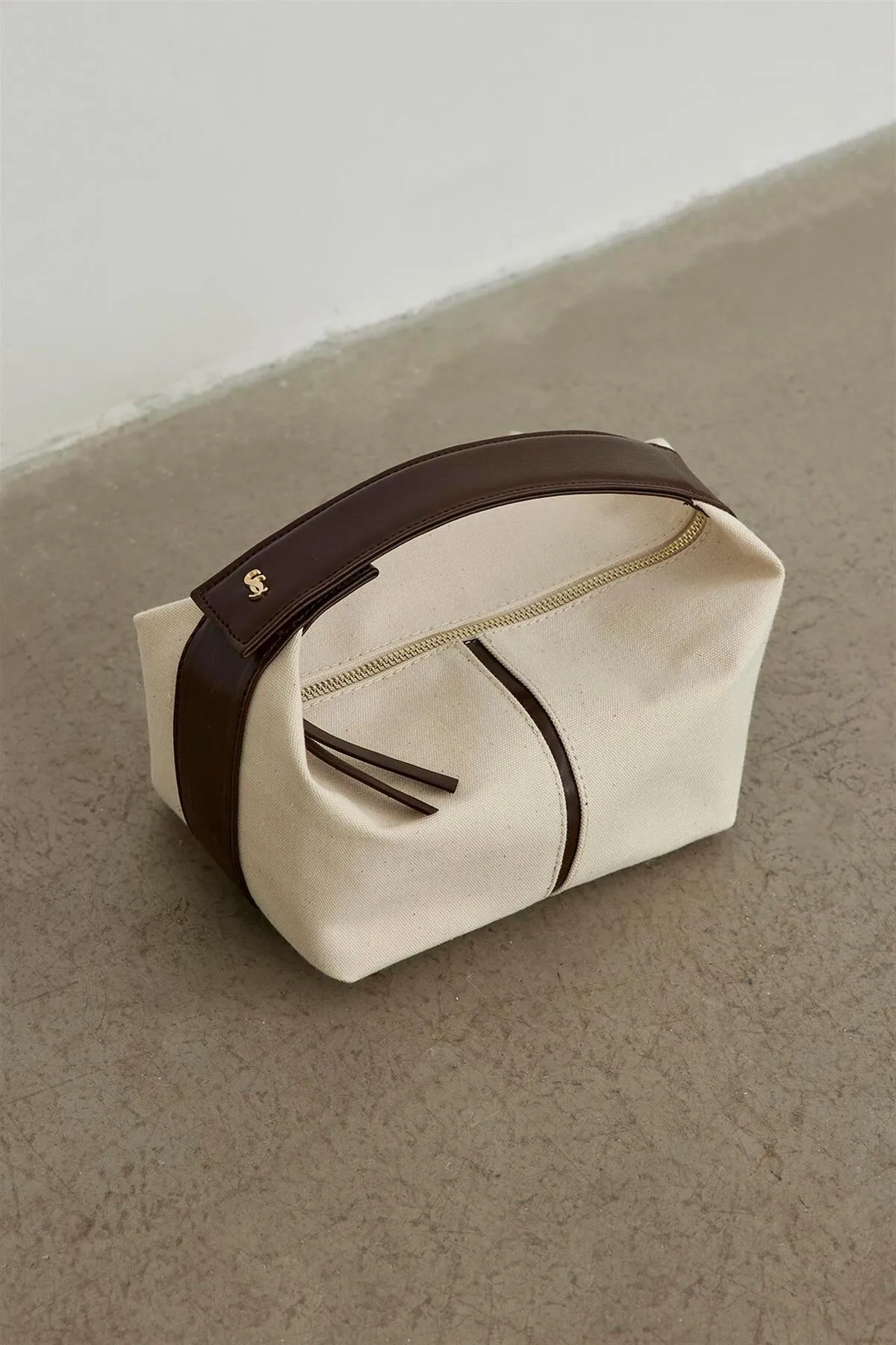 Suud Collection  Bitterbraune Archi Mini-Tasche