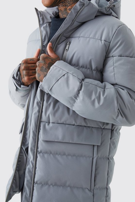 Lange Steppjacke mit Kapuze