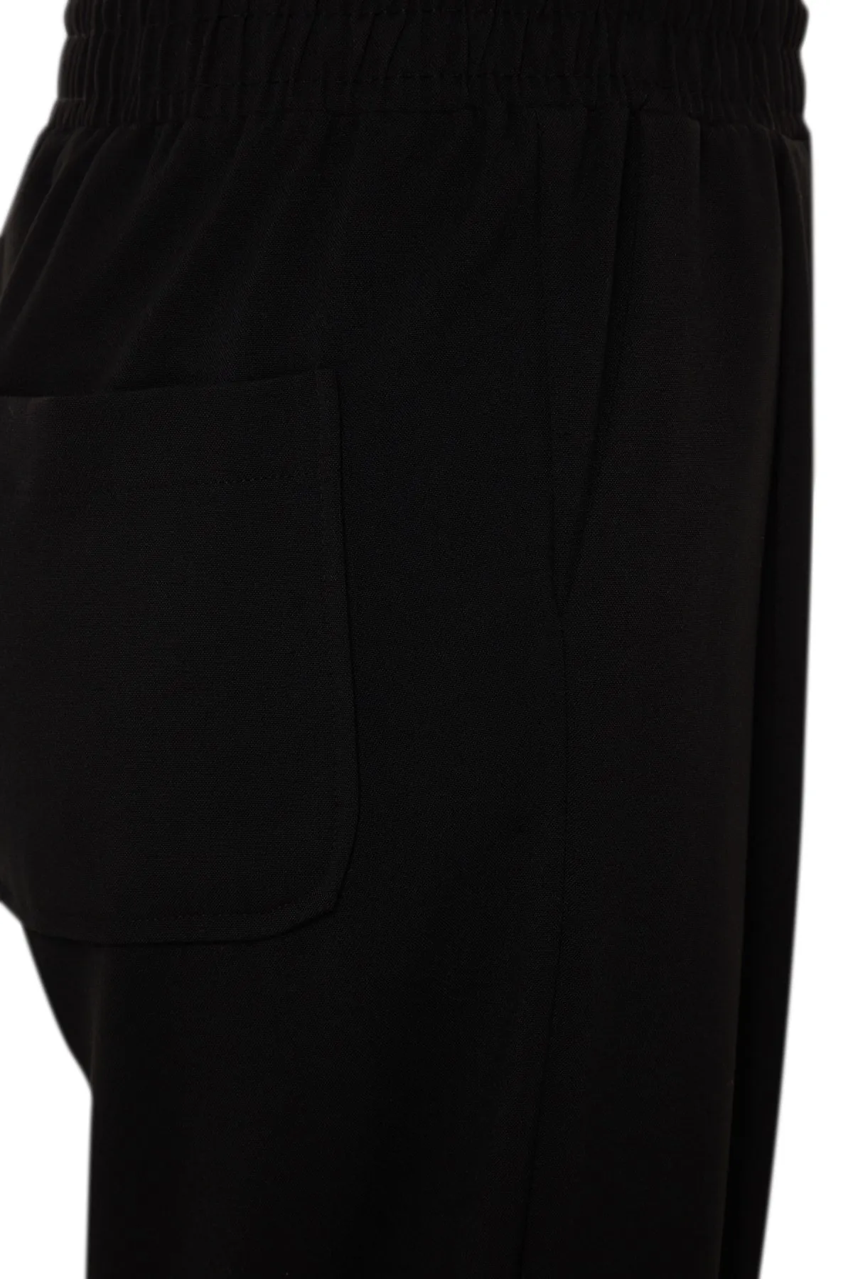 Trendyol Modest  X Kevser Sarıoğlu Schwarze gewebte Hose mit elastischem Bund TCLSS23TP00003