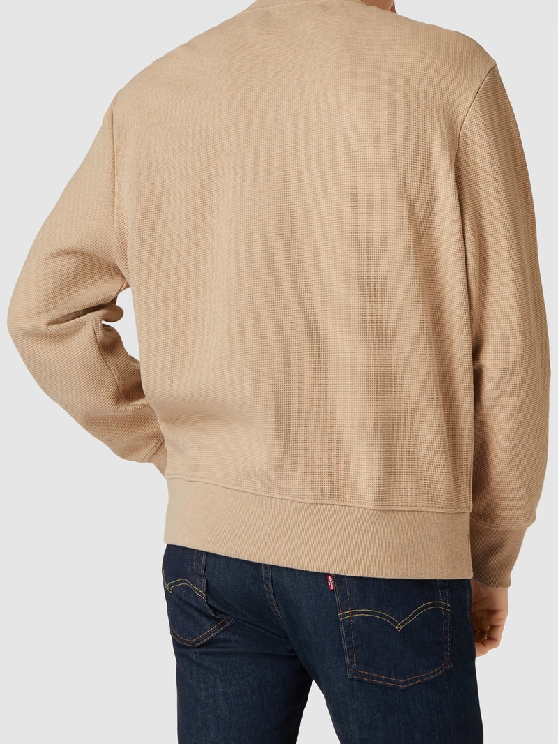 Strickpullover mit Label-Details in beige meliert