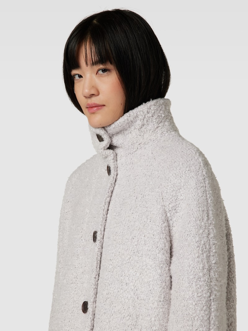 Kurzmantel mit seitlichen Eingrifftaschen in offwhite