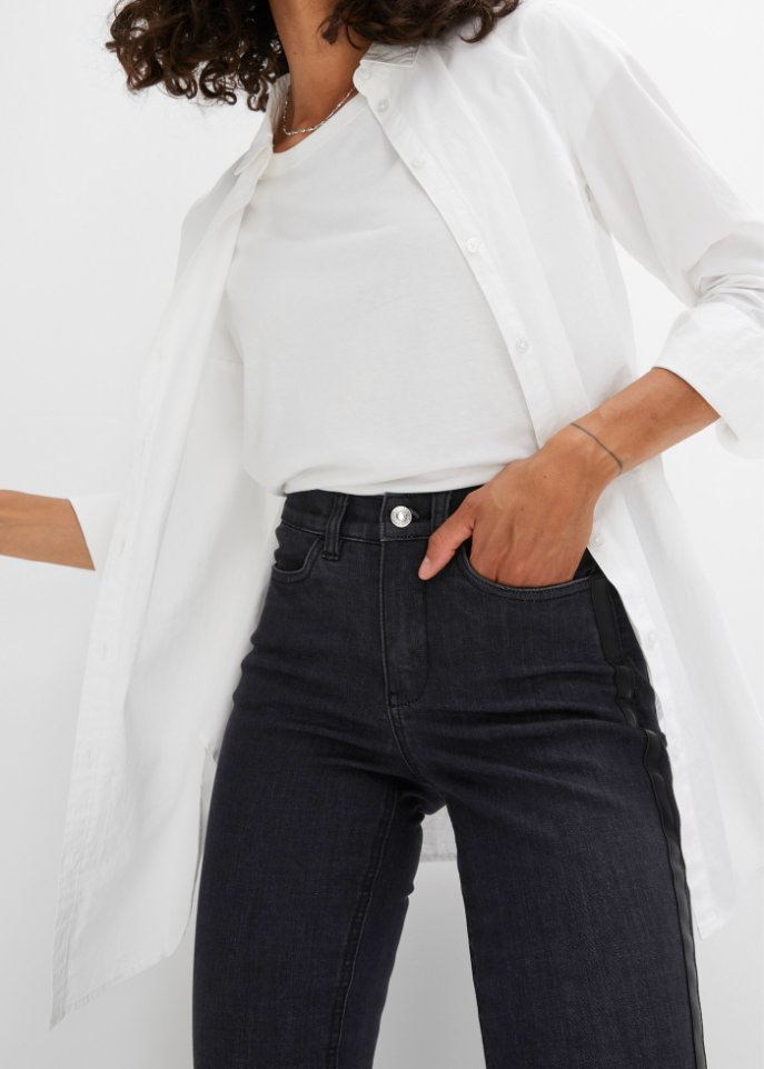 Stretch-Jeans mit Lederimitateinsatz