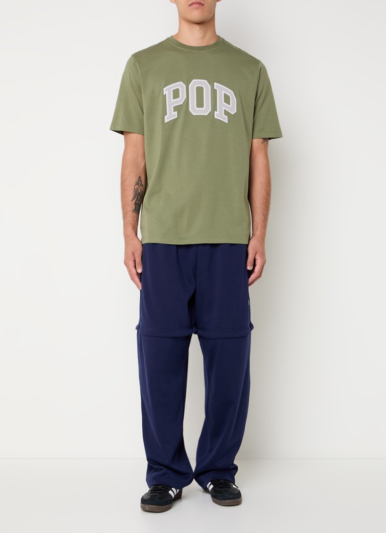 Pop Trading Company -t-paita, jossa on logobrodeeraus