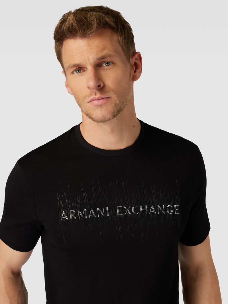 T-Shirt mit Strasssteinbesatz in schwarz