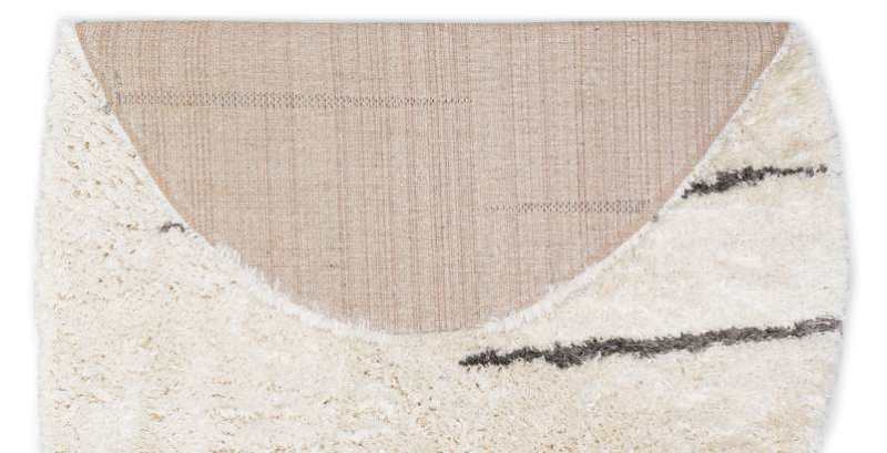 Tapis shaggy en fausse fourrure forme galet MELLOW