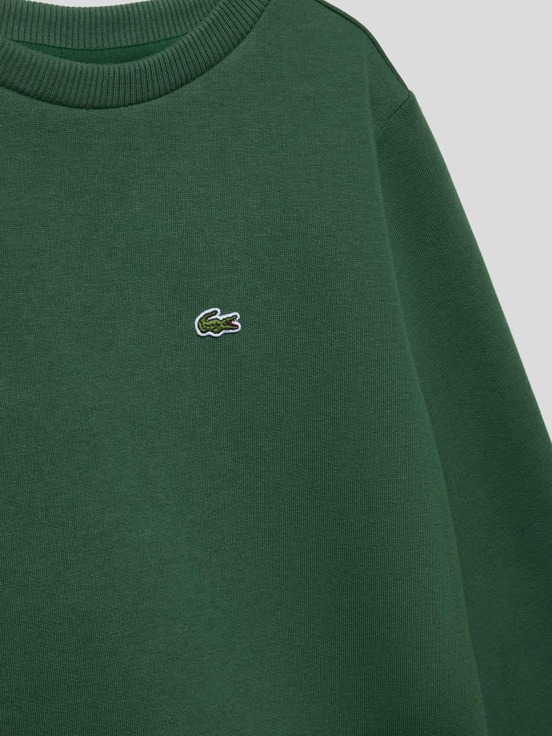 Sweatshirt mit Label-Applikation in dunkelgrün