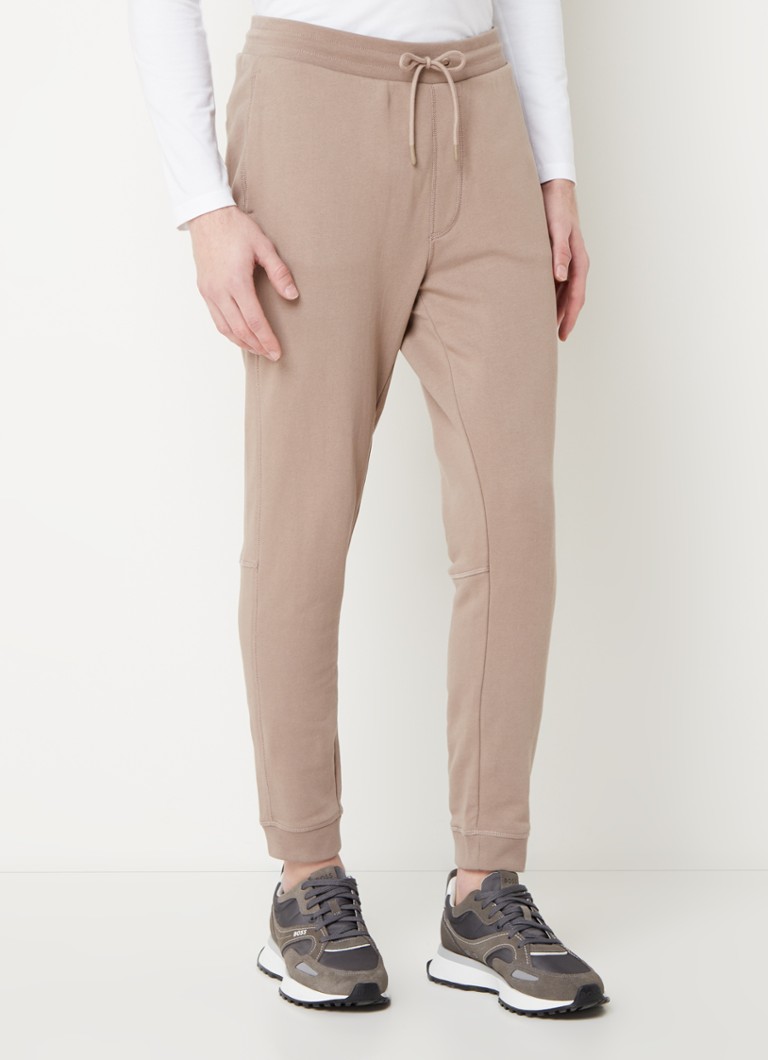 Pantaloni de trening slim fit de la HUGO BOSS, cu logo și buzunare laterale.