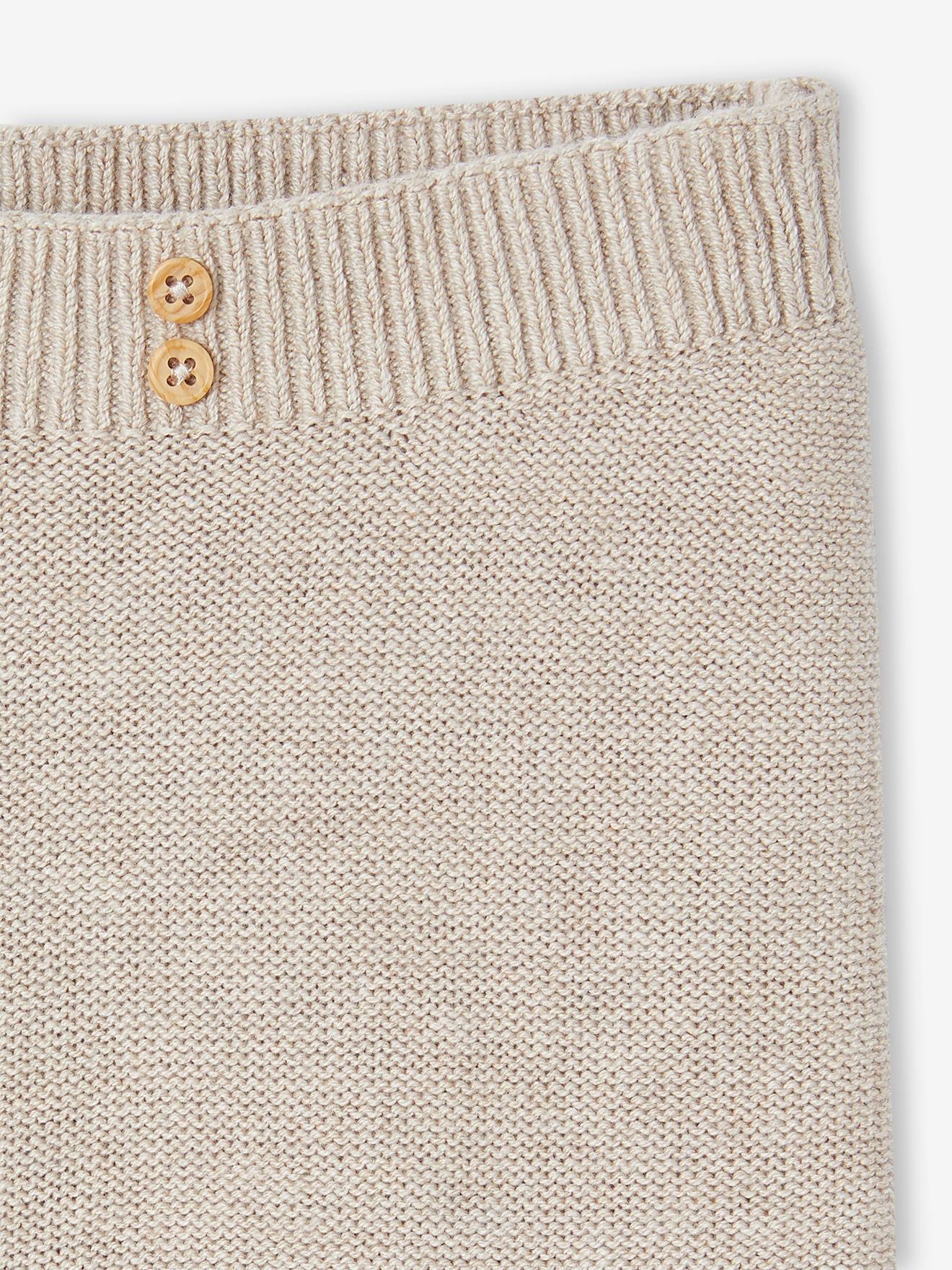 Pantalon en tricot bébé avec pieds beige chiné