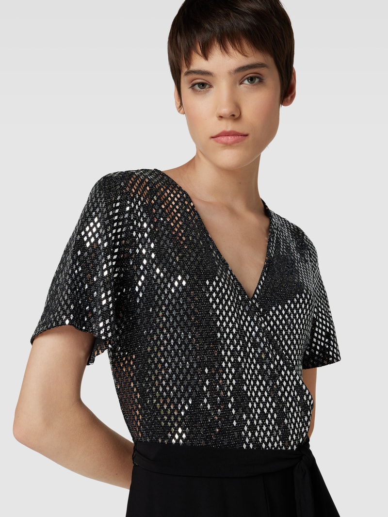 Jumpsuit mit V-Ausschnitt in schwarz