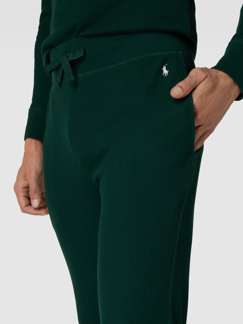 Sweatpants mit Logo-Stitching in dunkelgrün