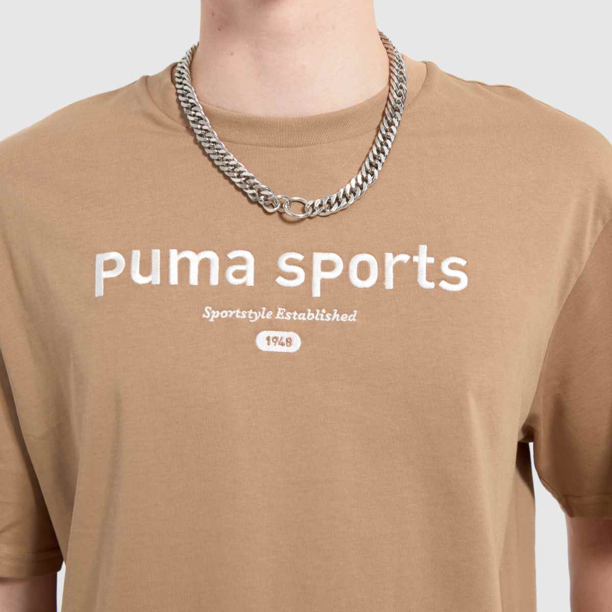 PUMA – Beige t-shirt med grafiskt tryck