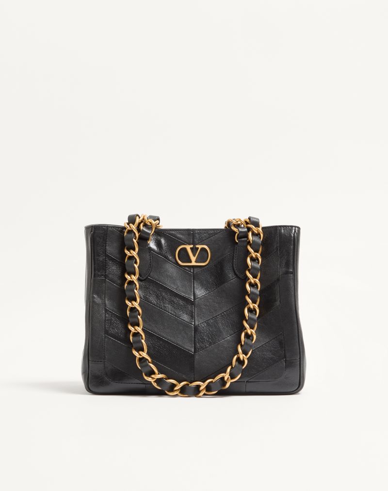 Bolsa de compras pequena Valentino Garavani Laseine em napa com estampa chevron.