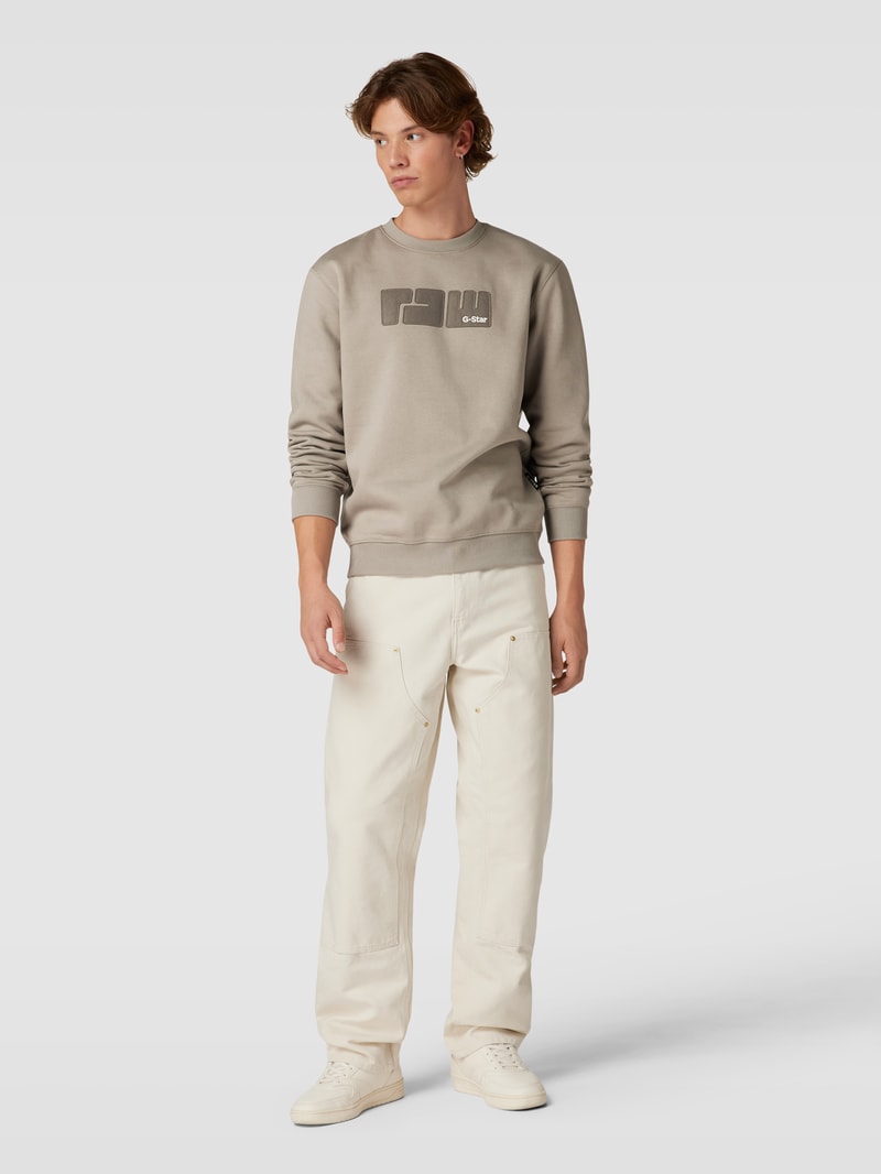 Sweatshirt mit Label-Stitching Modell 'RAW.' in beige