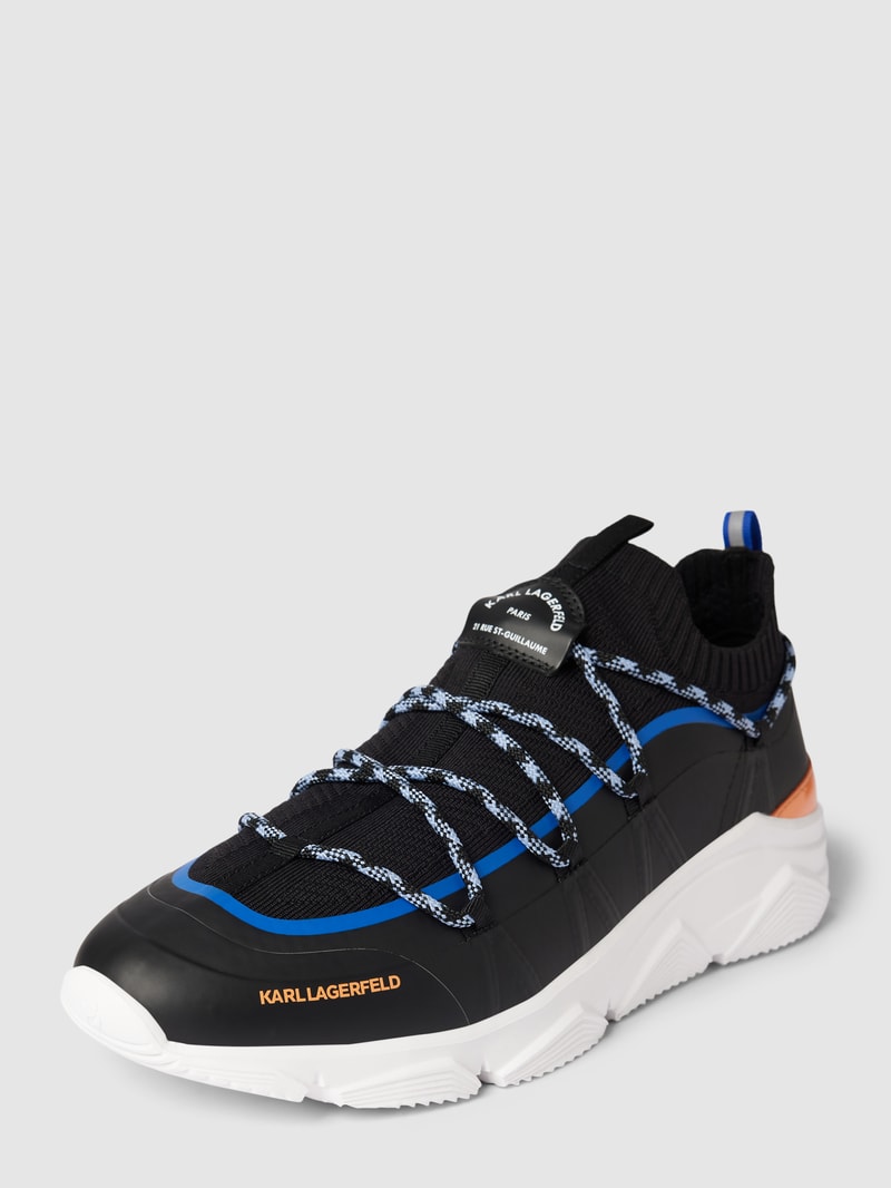 Sneaker mit elastischem Schaft und Schnürung in schwarz