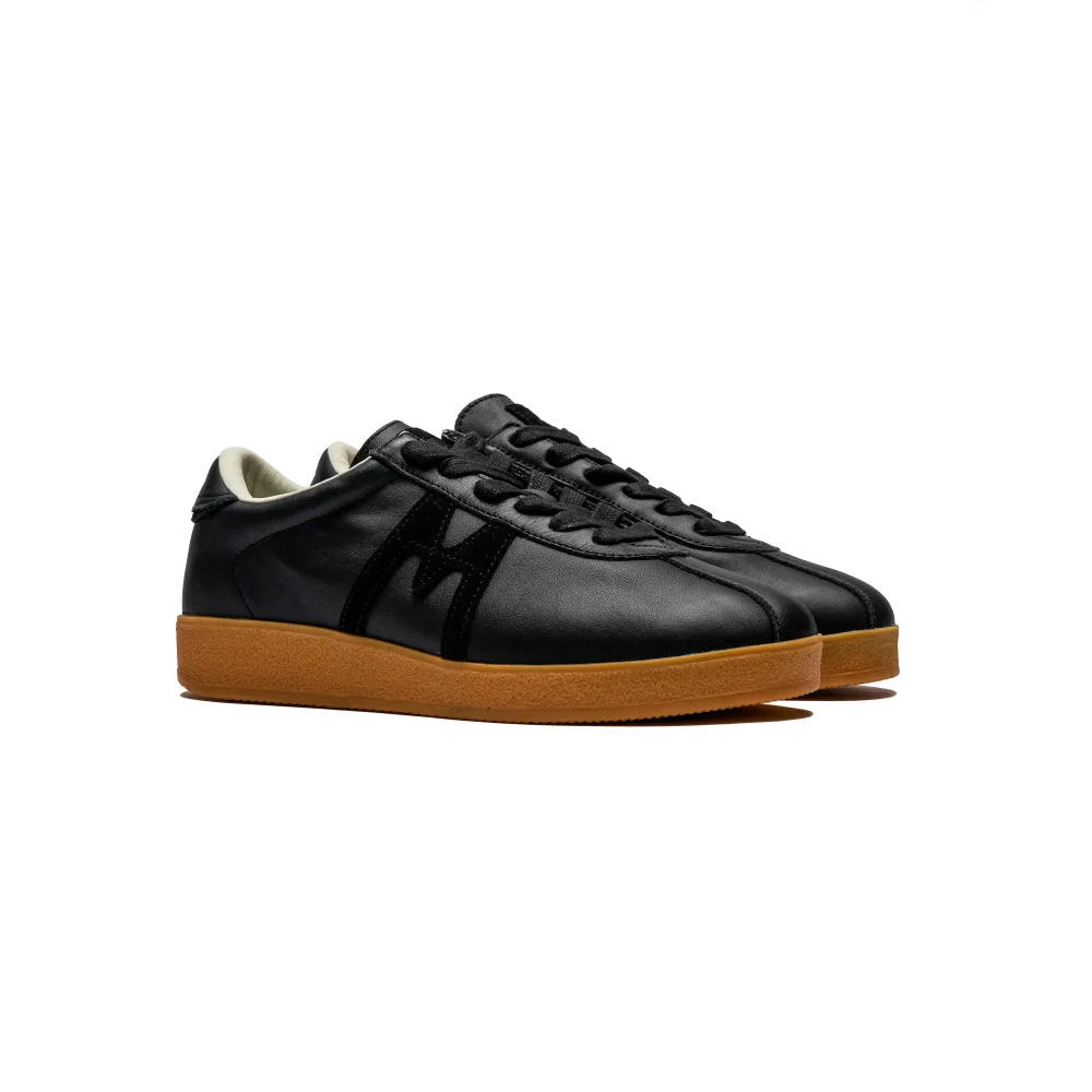 Karhu Trampas F809036 / schwarz