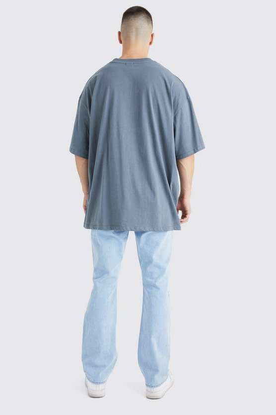 Tall Slim-Fit Schlagjeans mit Sternen-Applikation